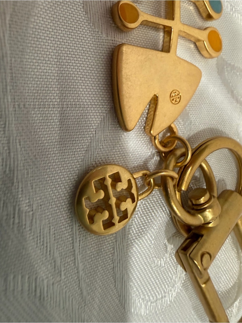 Tory Burch Gold Fishbone Keychain with Blue & Yellow Accents New - Picture 3 of 3